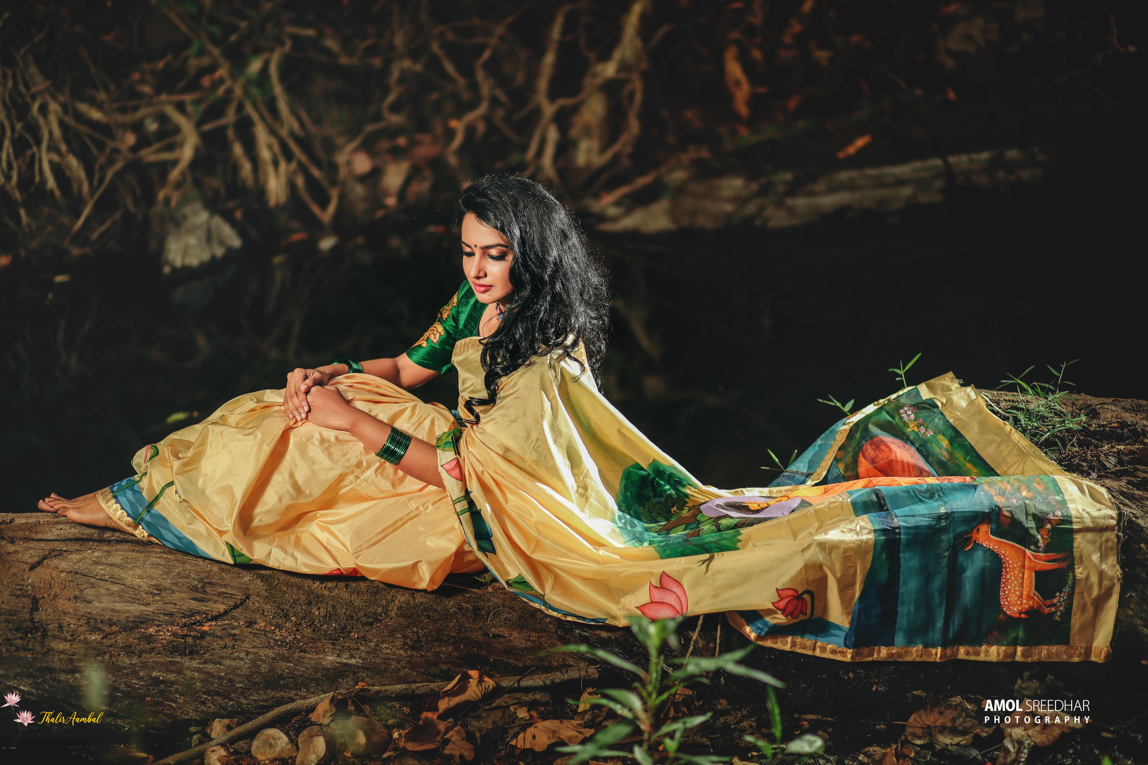 Bodhi Tree and budha: Hand-painted Pure Silk saree model wearing pallu view1–– ThalirAambal 