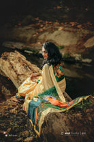 Bodhi Tree and budha: Hand-painted Pure Silk saree model wearing pallu view–– ThalirAambal 
