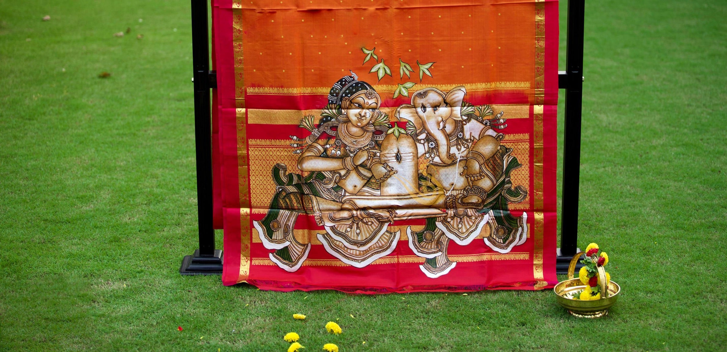 Parvathi and Ganesha: Hand-painted Kanchipuram Silk saree Orange colour– ThalirAambal